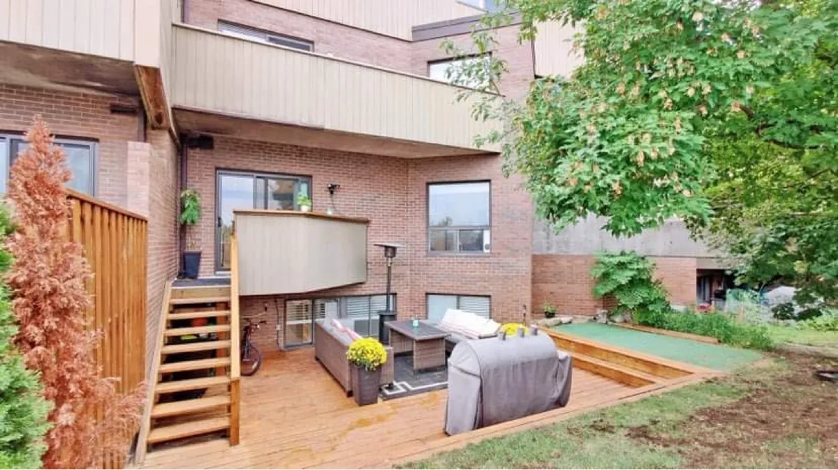 Recent Northern Deck project: pressure-treated wood deck in a townhouse backyard